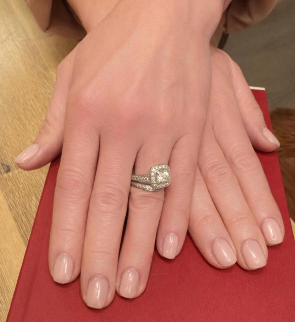 Natural nude pink manicure with square-cut diamond ring